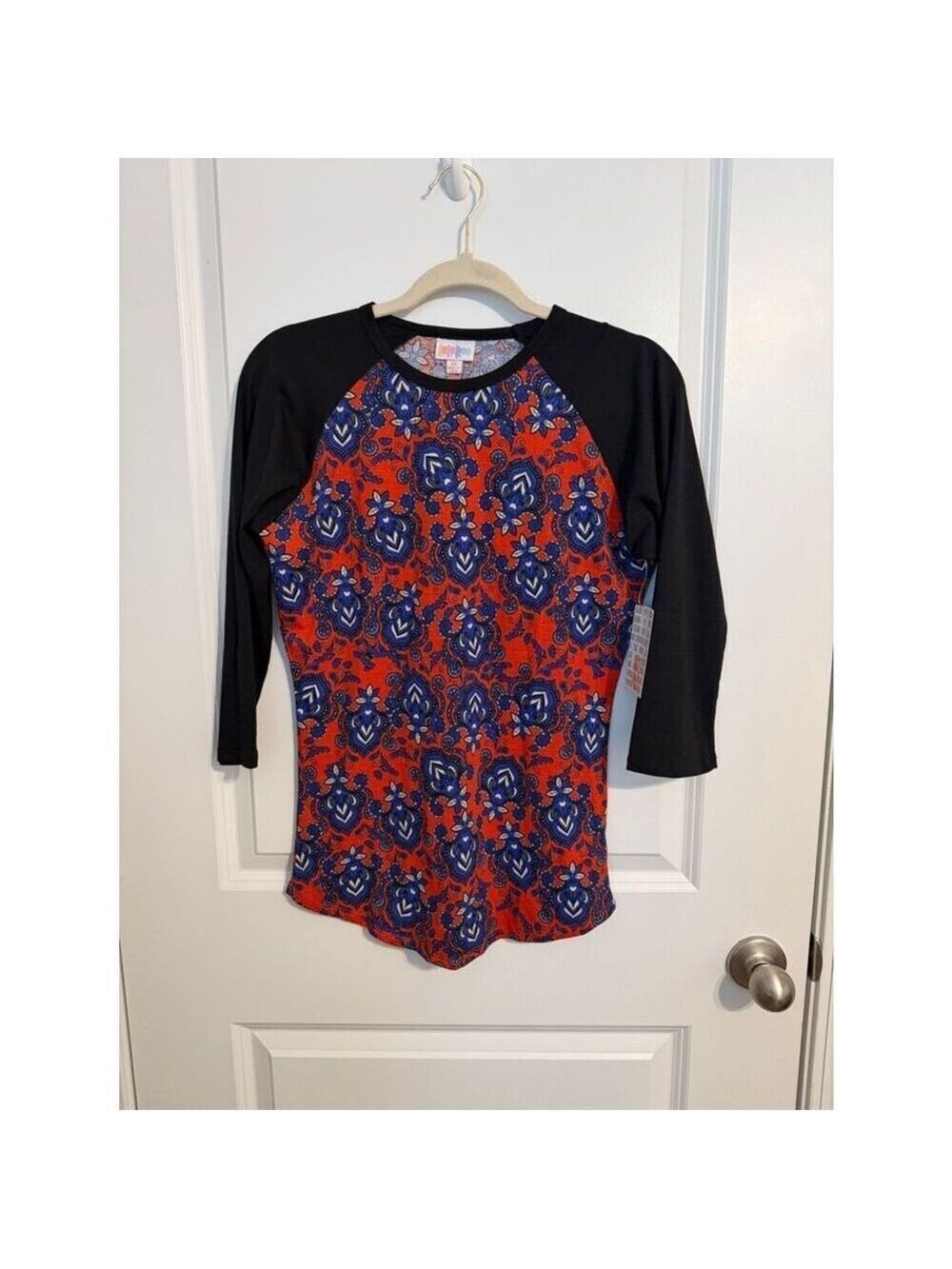 LuLaRoe Red and Blue Floral Raglan with Black Sleeves